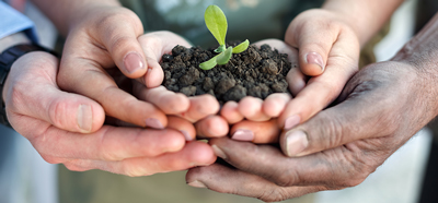 Photo with hands together helping - start a fund